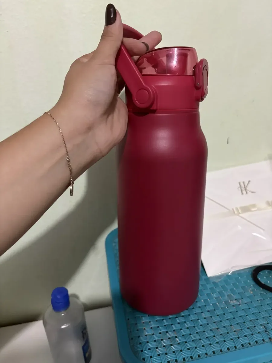Foto de cliente com a garrafa térmica (1)