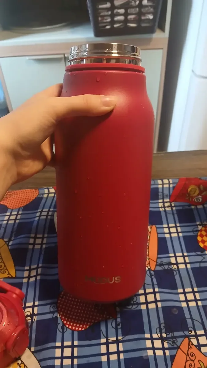 Foto de cliente com a garrafa térmica (4)